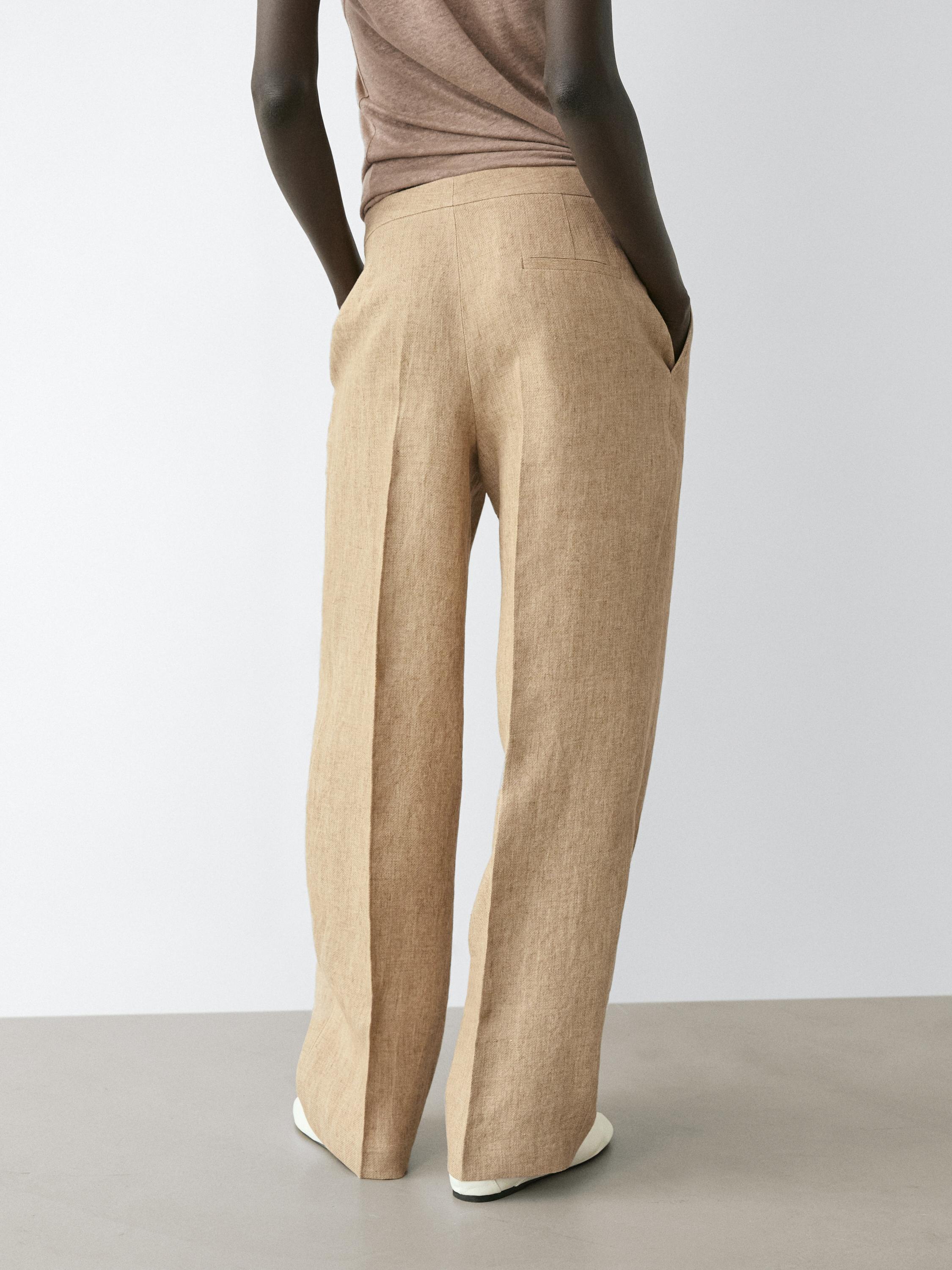Flowing linen trousers with darts